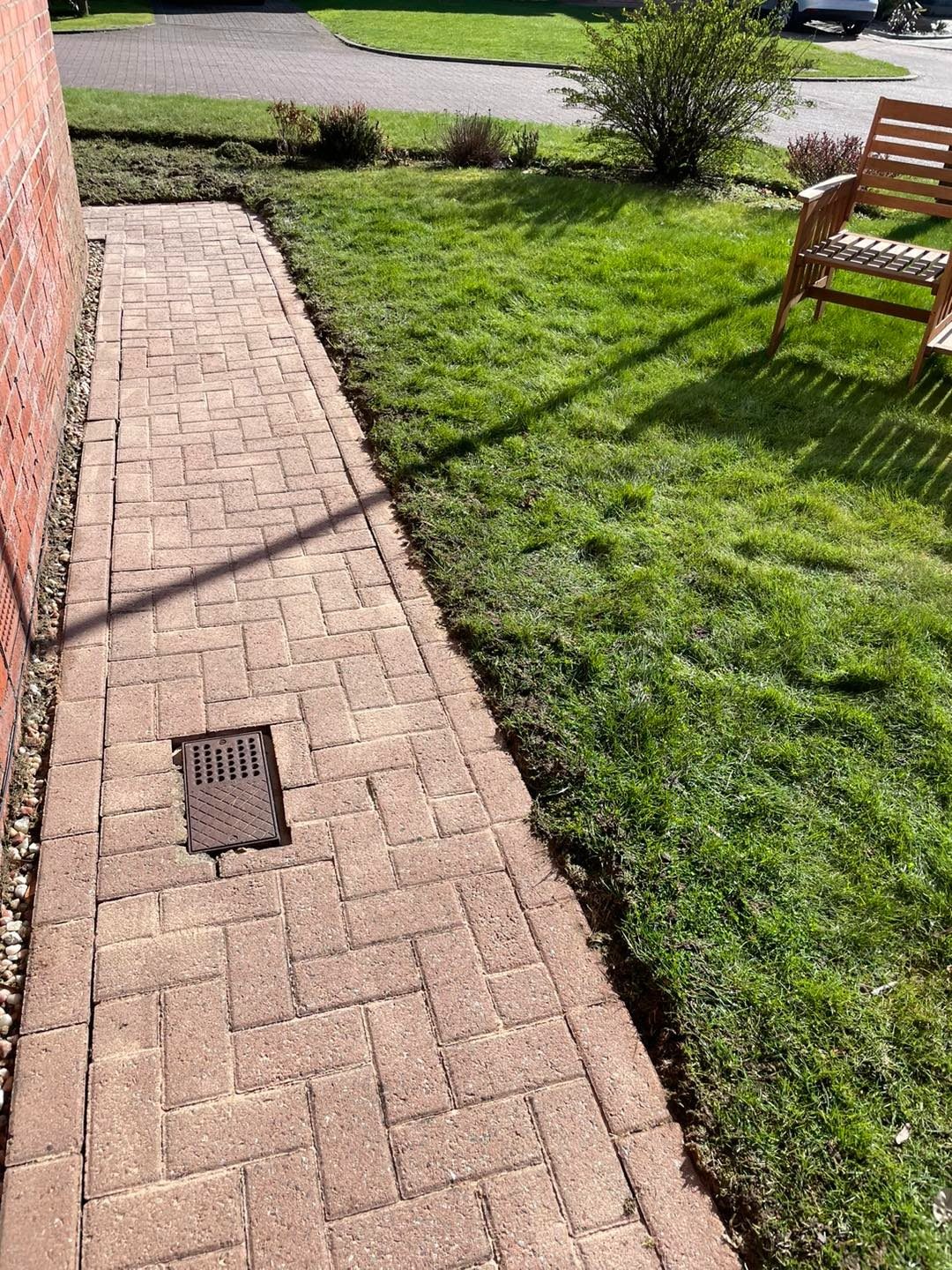 Clean herringbone block paving path in East Lothian