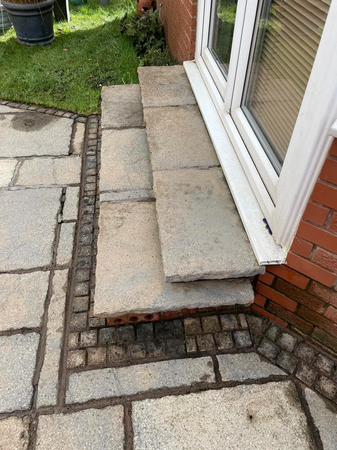 Clean stone slab patio and steps after power washing in East Lothian