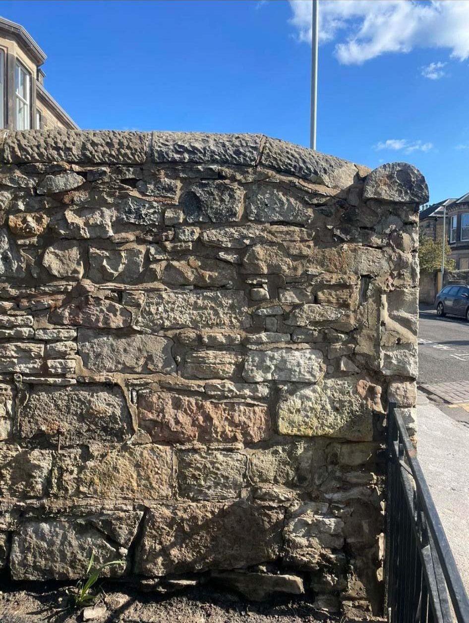 Natural stone wall after stone cleaning in East Lothian