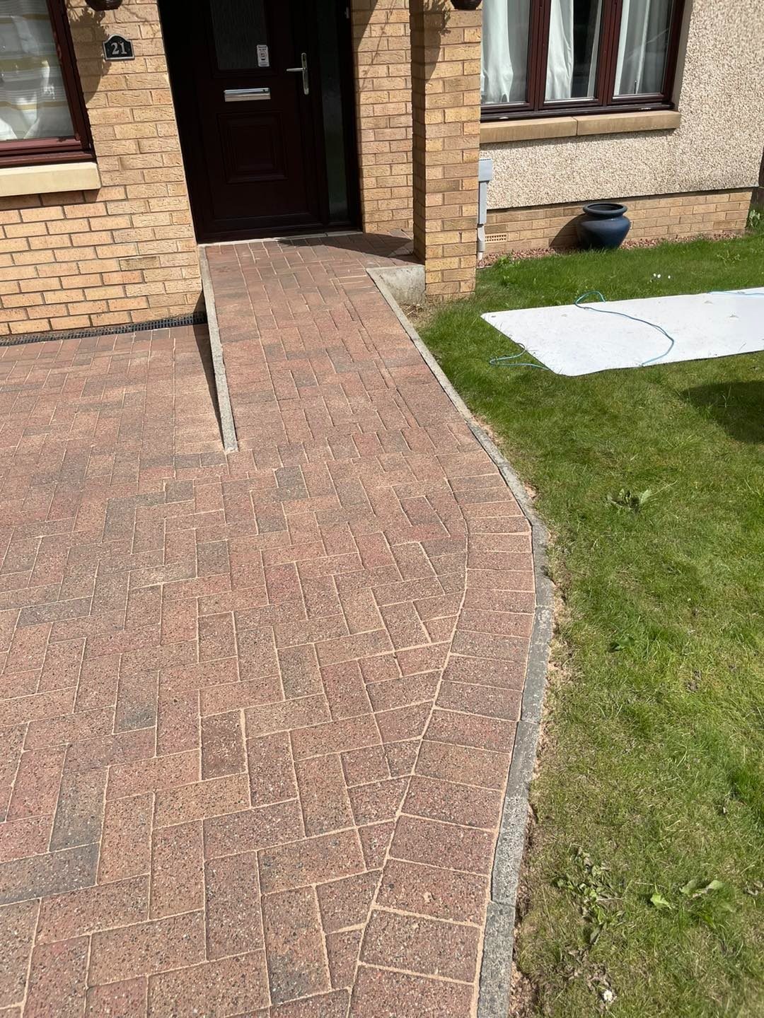 Clean red block paving path to a front door in Edinburgh