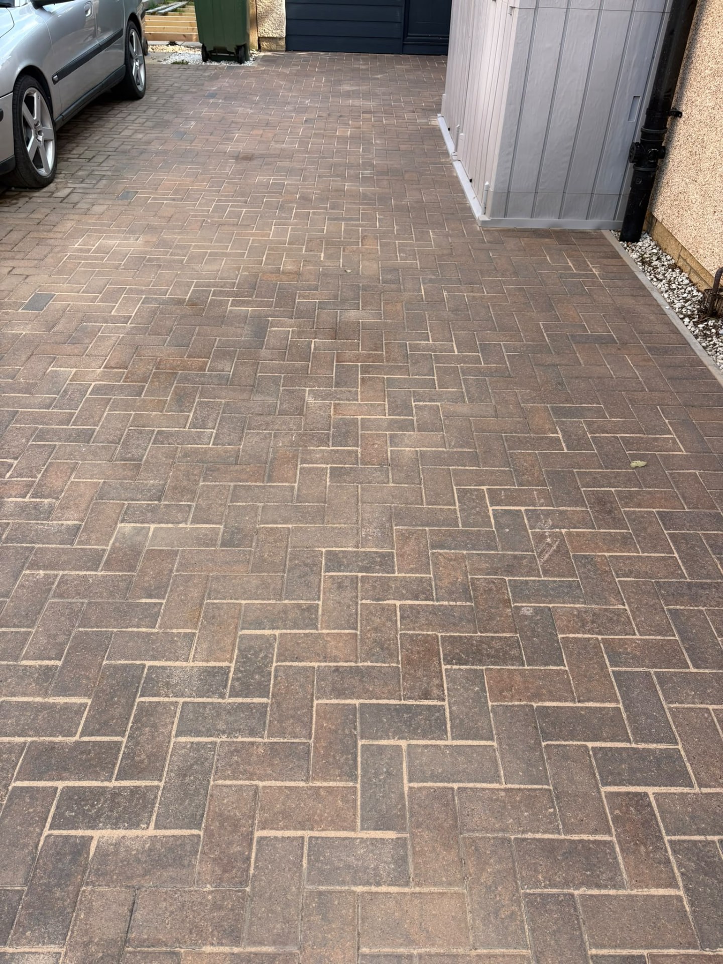 Herringbone block paving driveway after cleaning and re-sanding in Edinburgh